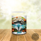 Close-up of detailed dragonfly design on custom coffee cup. Nature-themed dragonfly mug with bright colors.
